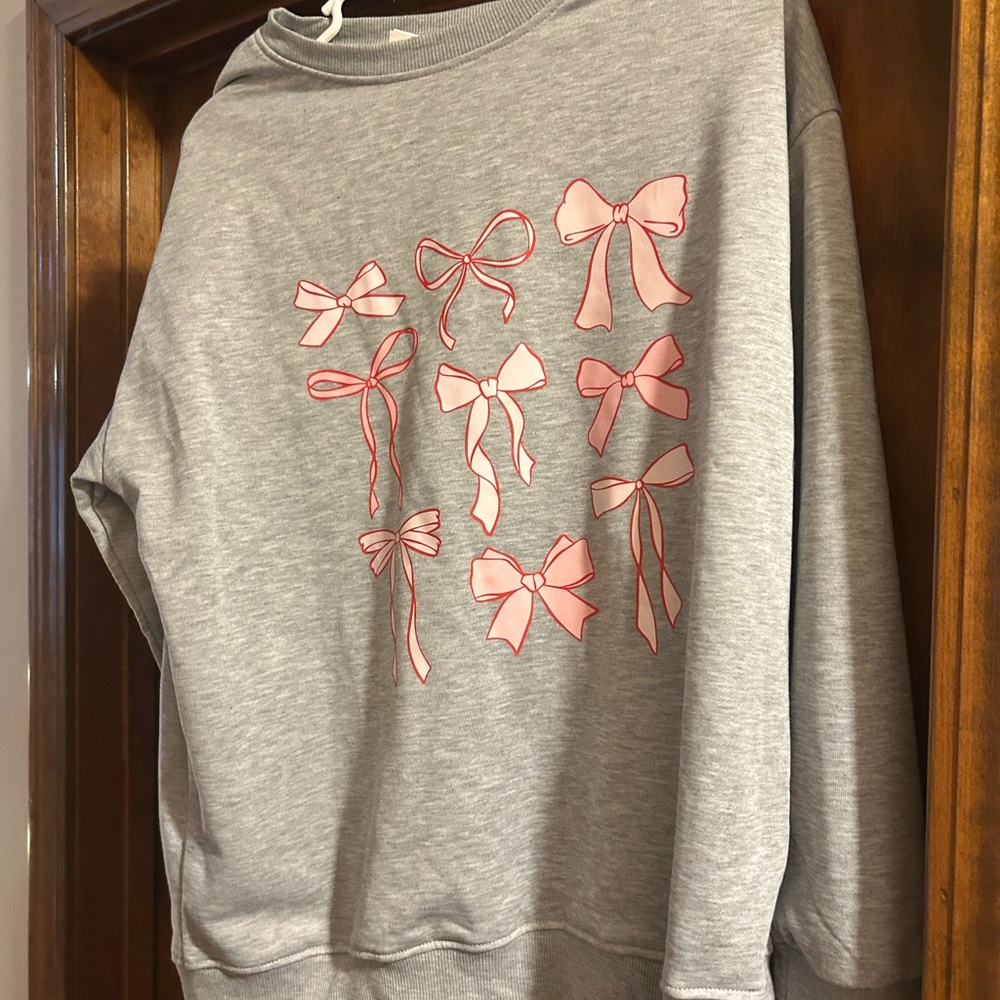 Gray Sweater with Pink Bow Design